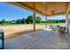 Expansive covered patio offers ample space for outdoor gatherings with views of the surrounding landscape at 1160 Springlake Rd, York, SC 29745