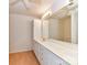 Primary bathroom features a double vanity, expansive mirror, and plenty of counter space at 11705 Silverado Ln, Charlotte, NC 28277