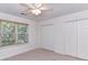 Cozy bedroom with carpet, closet with double doors, and a window providing natural light at 11705 Silverado Ln, Charlotte, NC 28277
