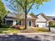 Charming home with a well-maintained lawn, beautiful landscaping, and inviting front entrance at 11705 Silverado Ln, Charlotte, NC 28277