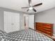 Bedroom featuring a ceiling fan, natural light, dresser and closet at 1217 Green Oaks Ln # K, Charlotte, NC 28205