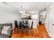 Open-concept living space combining dining area and a glimpse of the kitchen at 1217 Green Oaks Ln # K, Charlotte, NC 28205