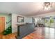 Finished basement boasts brick bar, wood floors, and a cozy atmosphere for entertaining guests and relaxing at 1218 Donna Dr, Shelby, NC 28152