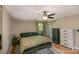 Comfortable bedroom with a ceiling fan, hardwood floors, natural light and a dresser at 1218 Donna Dr, Shelby, NC 28152