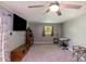 Relaxing bedroom retreat with a ceiling fan, soft carpet, and a large window for natural light at 1218 Donna Dr, Shelby, NC 28152