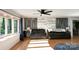 Bright living room featuring hardwood floors, a large bay window, and comfortable seating at 1218 Donna Dr, Shelby, NC 28152