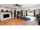 Bright and open living room with hardwood floors, fireplace, and an area rug at 1218 Donna Dr, Shelby, NC 28152
