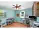 Bright office with a ceiling fan, wood floors and natural light from two windows at 1218 Donna Dr, Shelby, NC 28152