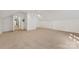 Spacious attic room with a neutral carpet and white trim at 1441 Carmel Rd, Charlotte, NC 28226