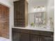 Bathroom features vanity with undermount sink and generous storage space at 1441 Carmel Rd, Charlotte, NC 28226