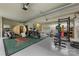 Spacious garage featuring multiple motorcycles, and gym equipment at 1441 Carmel Rd, Charlotte, NC 28226