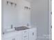 Bathroom with double vanity and white cabinets at 1504 Baileys Run, Gastonia, NC 28056