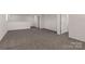 Spacious bonus room featuring neutral paint and carpet, with a view of multiple doorways at 1504 Baileys Run, Gastonia, NC 28056