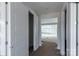 Bright hallway featuring white doors and trim, leading to an airy living space at 1504 Baileys Run, Gastonia, NC 28056
