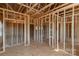 Unfinished interior showcasing wood framing and the future layout of the rooms at 1504 Baileys Run, Gastonia, NC 28056
