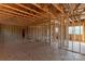 Open floor plan being built with wooden beams and natural light, ready for customization and completion at 1504 Baileys Run, Gastonia, NC 28056