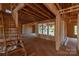 Staircase being built with wooden beams, leading to an upper level, ready for customization and completion at 1504 Baileys Run, Gastonia, NC 28056
