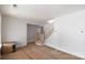 View of the stairway with natural wood handrails and white risers at 1504 Baileys Run, Gastonia, NC 28056