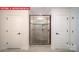 Modern bathroom features a glass-enclosed shower with tiled walls and dual entry doors at 156 Asmodean Ln, Troutman, NC 28166
