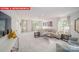 Inviting living room with comfortable seating, modern decor, and soft carpet at 156 Asmodean Ln, Troutman, NC 28166