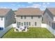 Spacious backyard with a patio area, outdoor furniture, and well-maintained landscaping, perfect for outdoor entertaining at 187 Longleaf Dr, Mooresville, NC 28117