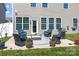 Spacious backyard with an open patio area with outdoor furniture and a grill, perfect for entertaining at 187 Longleaf Dr, Mooresville, NC 28117