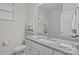Bathroom features a granite countertop, white vanity, and a shower with a glass door at 187 Longleaf Dr, Mooresville, NC 28117