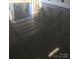 Durable garage floor with sealed coating at 187 Longleaf Dr, Mooresville, NC 28117