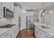Bright modern kitchen with white cabinets, stainless steel appliances, and a functional layout at 187 Longleaf Dr, Mooresville, NC 28117