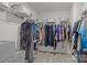 Organized walk-in closet featuring shelving, hanging rods, and baskets for storage at 187 Longleaf Dr, Mooresville, NC 28117