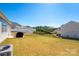 Expansive backyard with well-maintained lawn, offering privacy and space for outdoor activities and enjoyment at 19010 Hawk Haven Ln, Charlotte, NC 28278