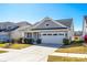 Charming single-Gathering home with a well-manicured lawn, a two-car garage, and a welcoming entrance at 19010 Hawk Haven Ln, Charlotte, NC 28278