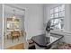 Cozy breakfast nook with black countertop and seating, view of formal dining room at 2125 Kenilworth Ave, Charlotte, NC 28203