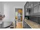 Open kitchen featuring stainless steel appliances and a stylish breakfast nook at 2125 Kenilworth Ave, Charlotte, NC 28203