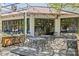 Outdoor seating area with multiple tables, chairs, and a covered roof at 2125 Kenilworth Ave, Charlotte, NC 28203