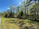 Expansive lot with a mix of open space and mature trees at 215 Old Dixie Rd, Lancaster, SC 29720