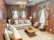 A professionally staged living room features updated furniture, rug, and decor at 215 Old Dixie Rd, Lancaster, SC 29720