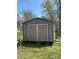 Durable outdoor shed with double doors, perfect for storage at 215 Old Dixie Rd, Lancaster, SC 29720