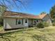 Charming home with a traditional design, shutters, and a well-kept lawn at 215 Old Dixie Rd, Lancaster, SC 29720
