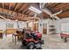 Unfinished basement area featuring work benches, storage, and exposed ductwork at 2281 Old Salisbury Concord Rd, Concord, NC 28025