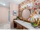 Unique bathroom features designer wall paper, a stylish vanity with a white sink, and a tub/shower combo at 2281 Old Salisbury Concord Rd, Concord, NC 28025