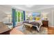 Charming bedroom boasts hardwood floors, accent furniture and natural light, creating a welcoming space at 2281 Old Salisbury Concord Rd, Concord, NC 28025