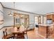 Cozy dining area with hardwood floors and views to the front yard and kitchen at 2281 Old Salisbury Concord Rd, Concord, NC 28025