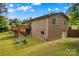 Charming brick home showcasing an outdoor deck with a spacious backyard and a fire pit at 2281 Old Salisbury Concord Rd, Concord, NC 28025