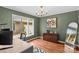 Cozy office space featuring green walls, hardwood floors, and a bright window with an outside view at 2281 Old Salisbury Concord Rd, Concord, NC 28025