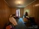 A room with wood paneling and ample space for storage at 267 Hall Nw Ave, Concord, NC 28027