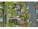 Aerial shot showcasing waterfront homes, private docks, and lush greenery surrounding a serene lake at 276 Greyfriars Rd, Mooresville, NC 28117