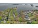 Overhead view of luxury waterfront real estate with private docks and neighborhood amenities at 276 Greyfriars Rd, Mooresville, NC 28117
