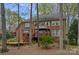 Expansive deck on beautiful brick home, ideal for enjoying the backyard scenery at 276 Greyfriars Rd, Mooresville, NC 28117