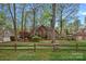 Charming brick home featuring a well-manicured front yard and inviting curb appeal at 276 Greyfriars Rd, Mooresville, NC 28117